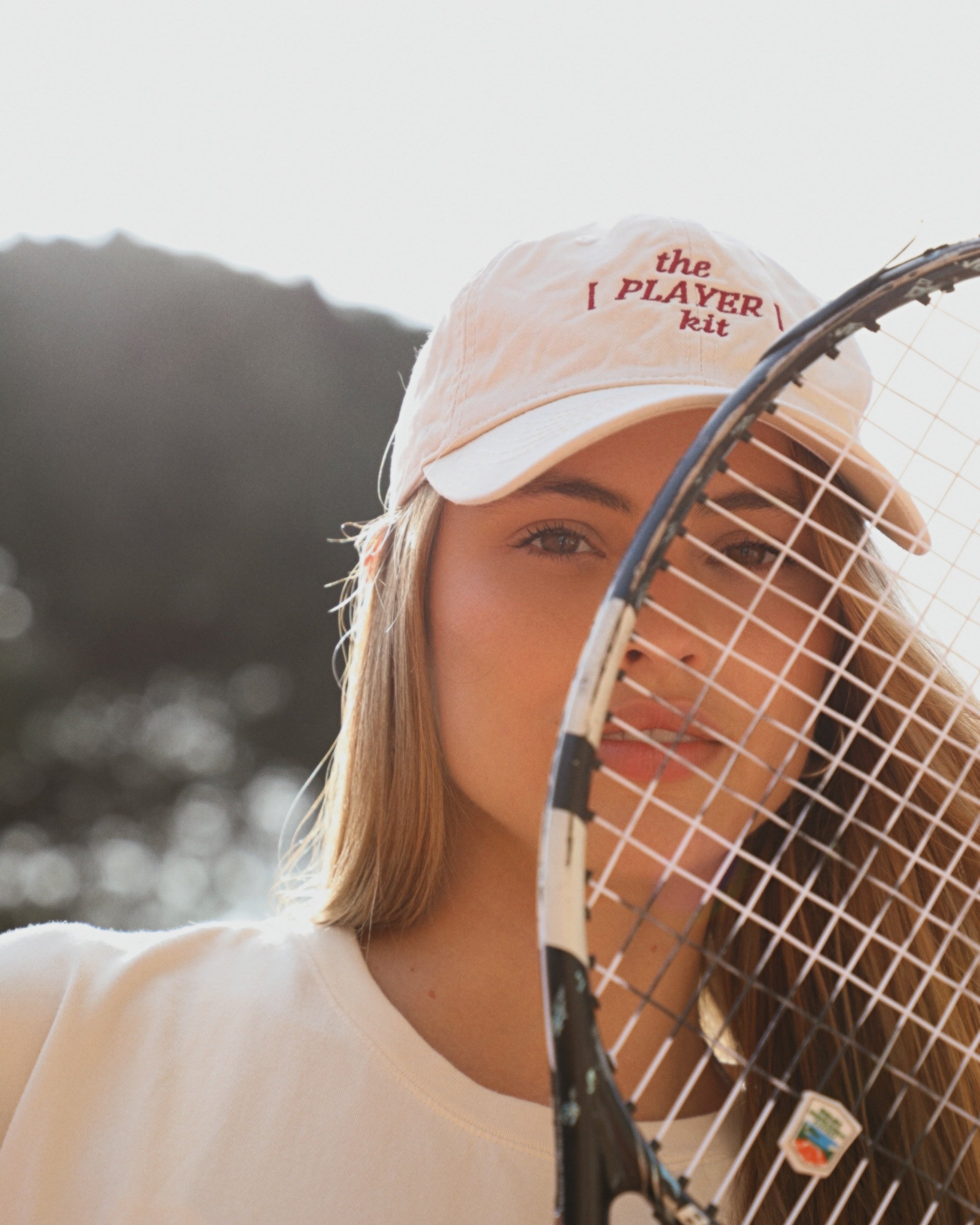 The [PLAYER] kit cap