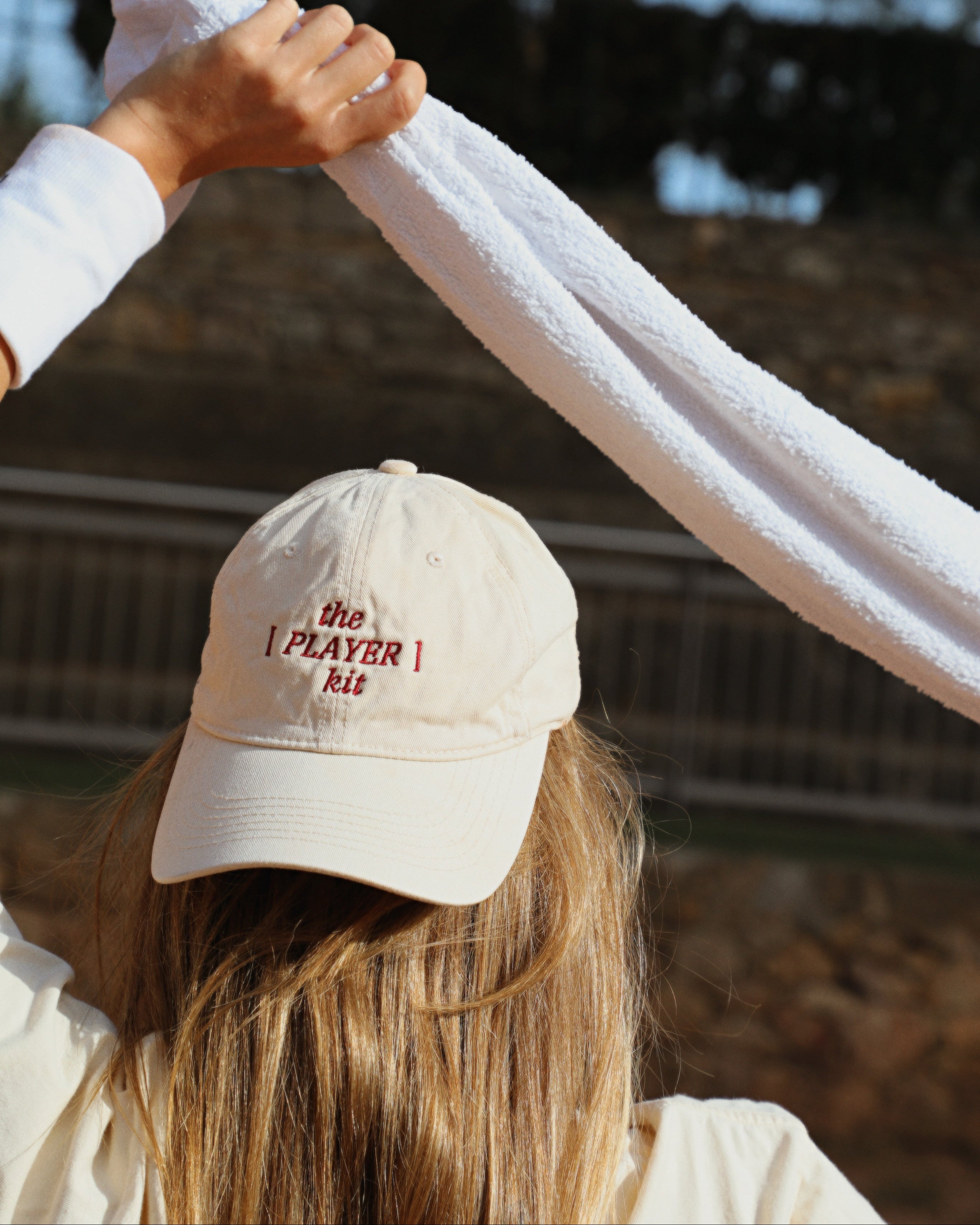 The [PLAYER] kit cap