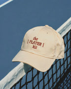 The [PLAYER] kit cap
