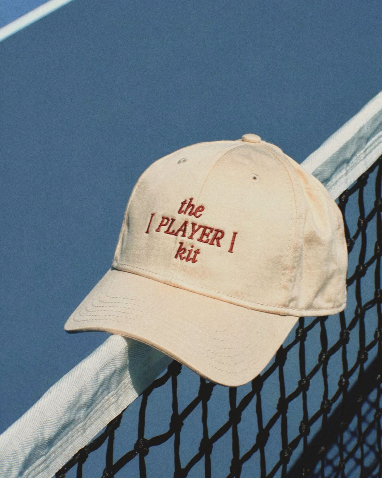 The [PLAYER] kit cap