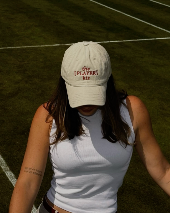 The [PLAYER] kit cap